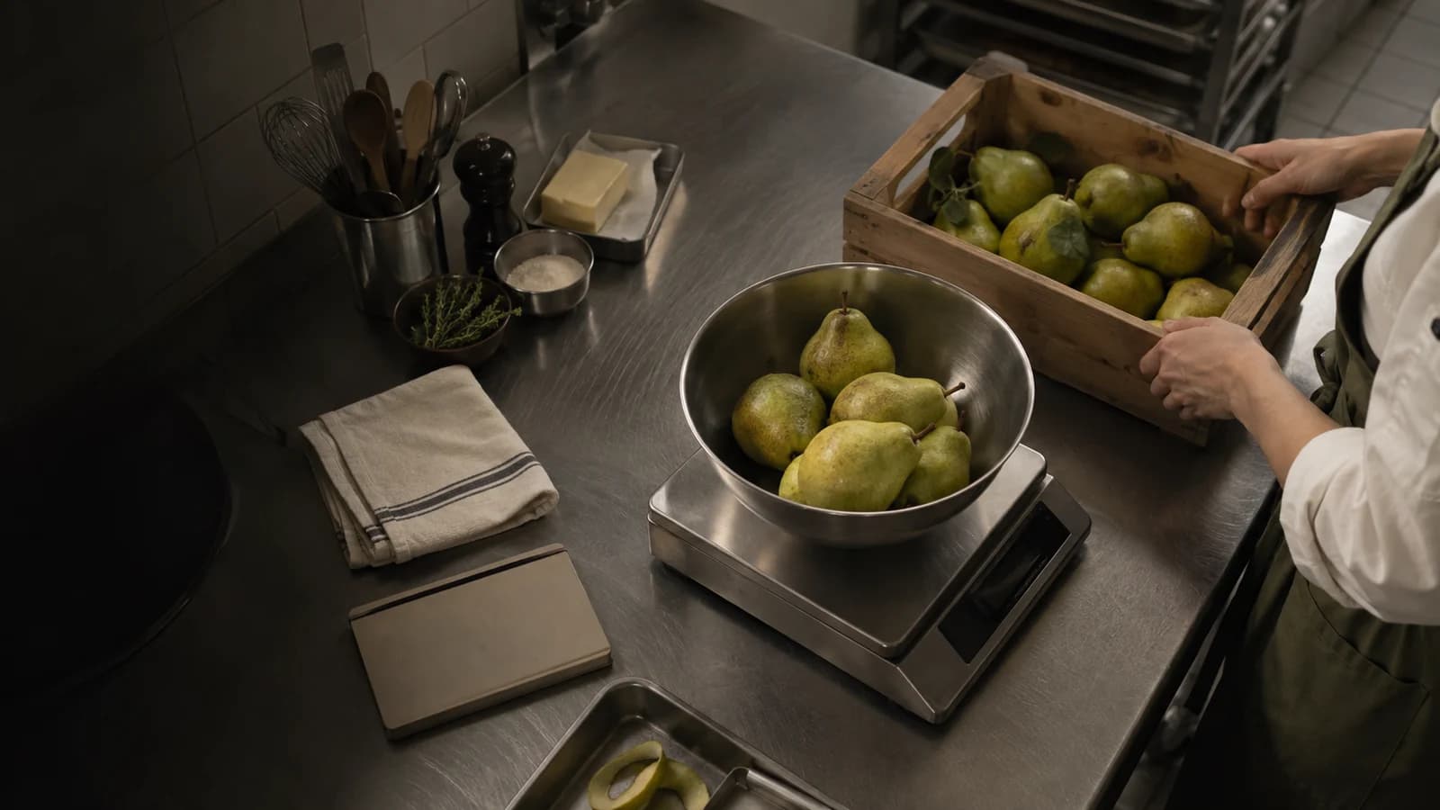 Illustrative kitchen photograph with produce and a working notebook